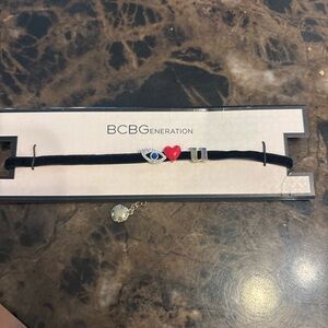BCBGeneration Black Choker with Eye and Heart Accents